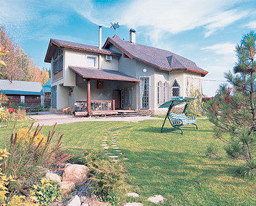 Двухэтажный загородный дом площадью 301,5 кв. м