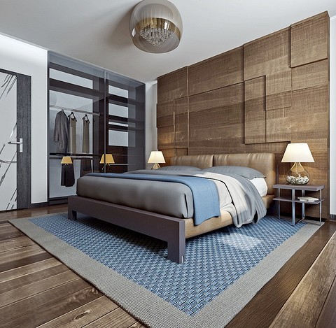 В интерьере спальни используется тот же приём, что и в гостиной: одна стена обшита наборными шпонированными панелями, создающими рельефную поверхность. Предметы интерьера природных оттенк...