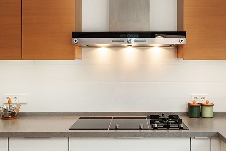 Высота вытяжки над плитой: нормы и рекомендуемые расстояния