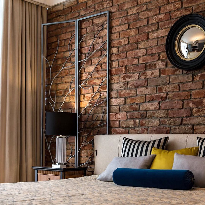 Кирпичная стена в интерьере: варианты применения, подходящие стили и 63 фото